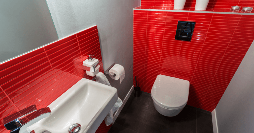 Smart Toilet Features- A sleek, modern toilet with a digital control panel, automatic flushing, and built-in bidet and air dryer. LED lights illuminate the interior, and sensors detect when the user approaches