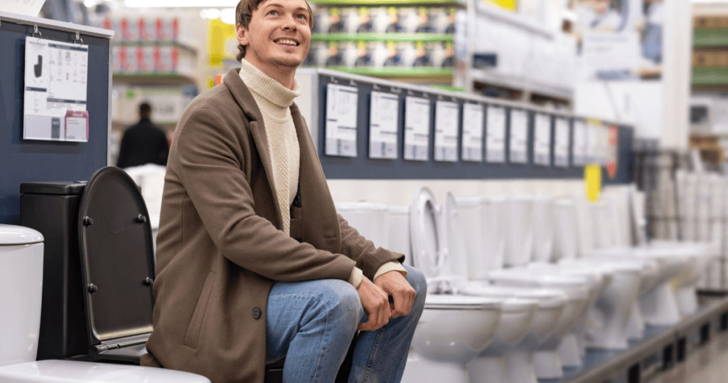 Smart Toilet Features- A sleek, modern toilet with a digital control panel, automatic flushing, and built-in bidet and air dryer. LED lights illuminate the interior, and sensors detect when the user approaches