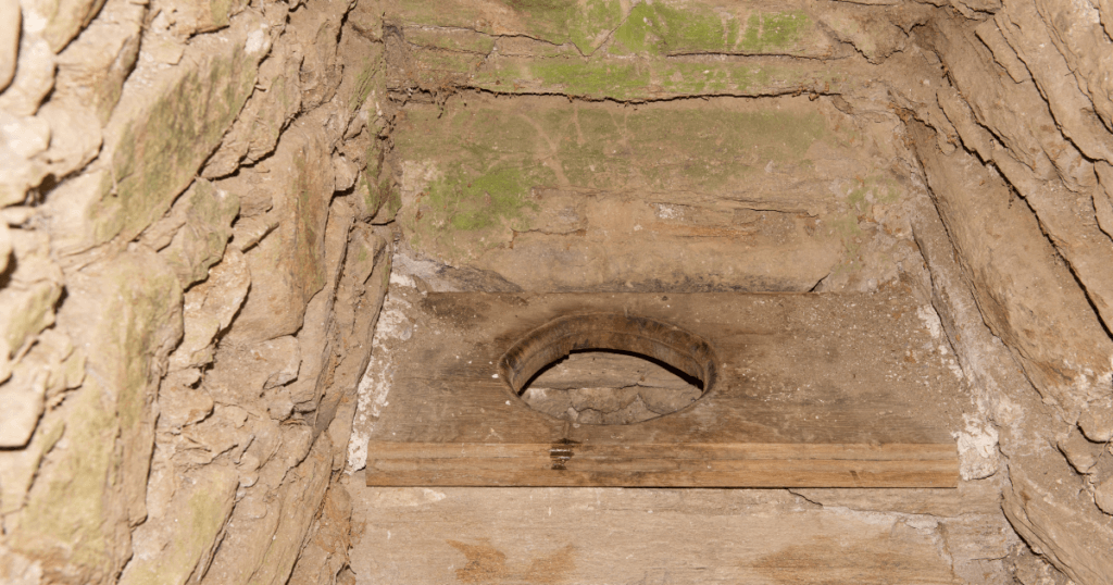 When Was the Toilet Seat Invented-old stone toilet 